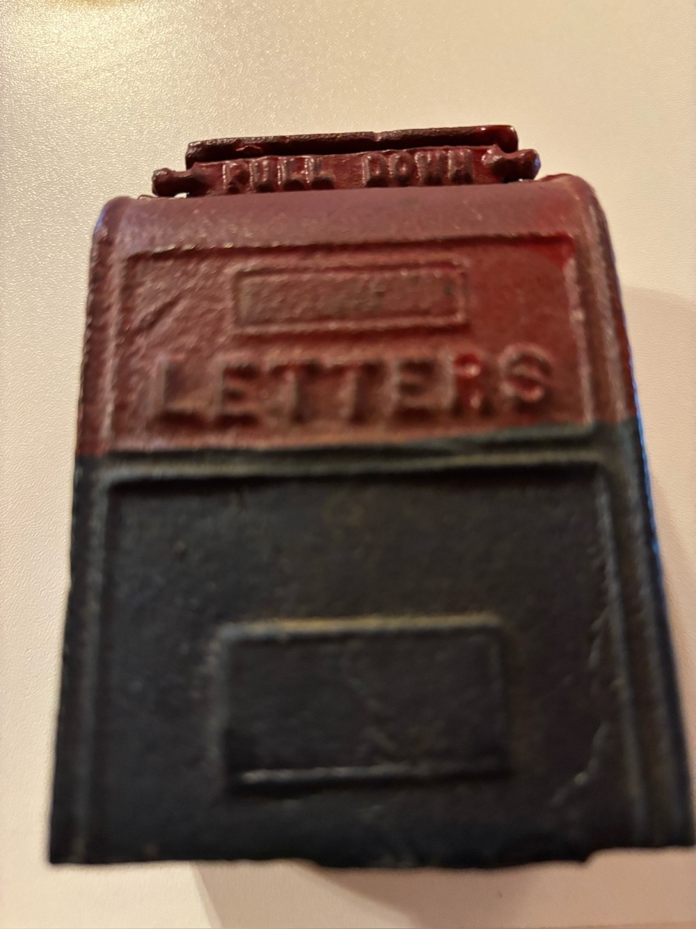 Cast iron stamp roll dispenser